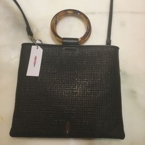 Thacker leather convertible purse